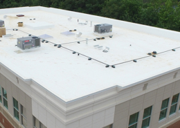 A split image showing different types of commercial roofs.