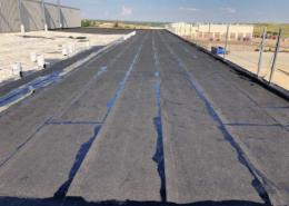 A built-up roof on a commercial property.