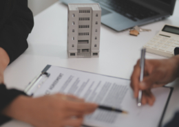 A business owner discussing commercial roofing financing options with a lender.