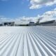 A building’s recently installed commercial metal roofing.