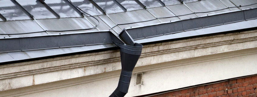 Heat cables installed along the edge of a roof as a means of ice dam prevention.