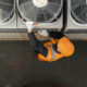 Professional servicing a commercial HVAC system.