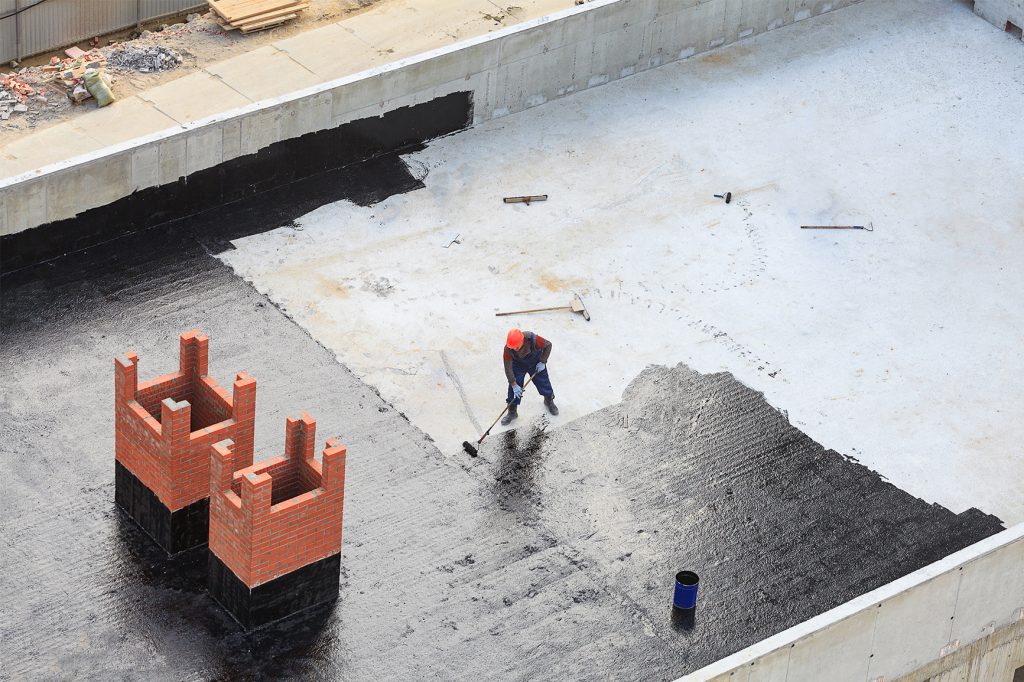 Commercial roof requiring repair and restoration services.