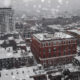 Snow Falling on City